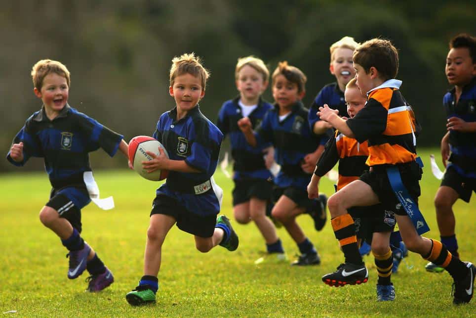 Kids playing rugby