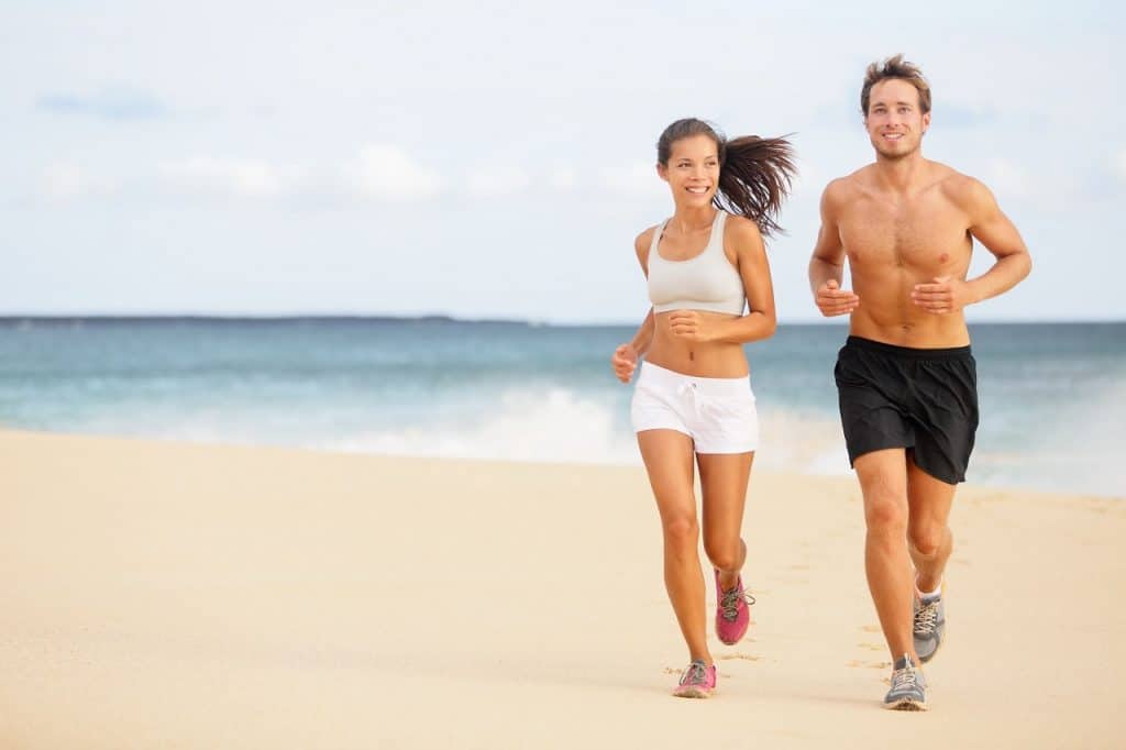 healthy couple running