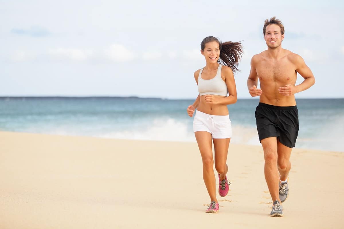 healthy couple running