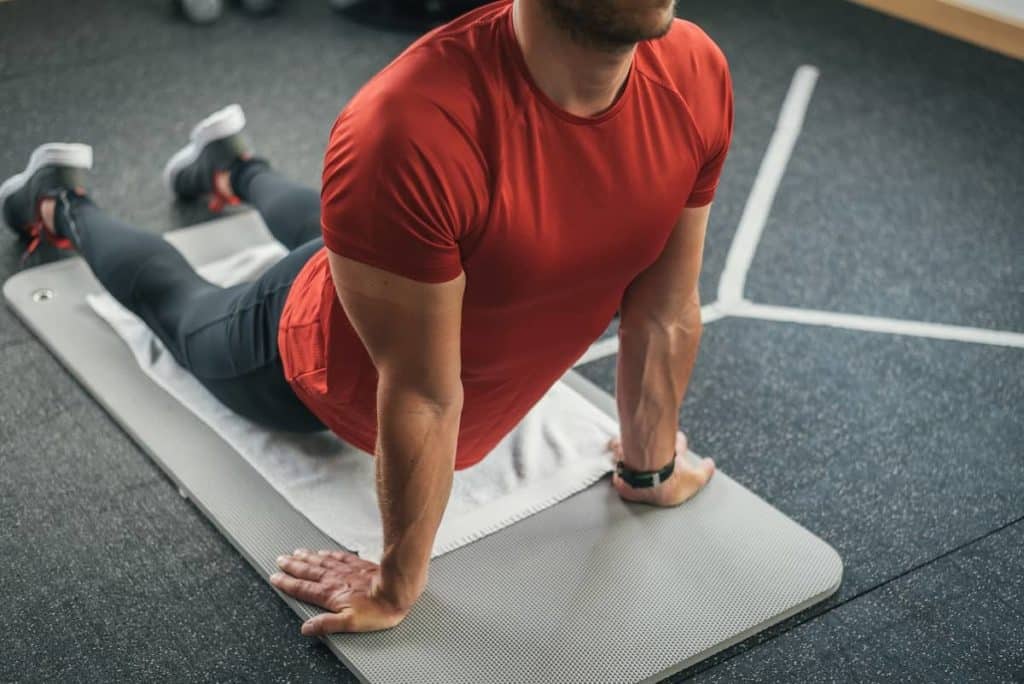 Man using PNF stretching