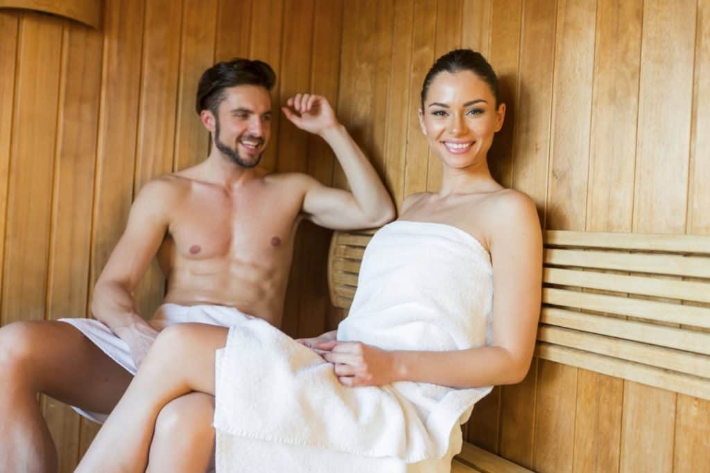 young couple relaxing shows what can the sauna do for athletes