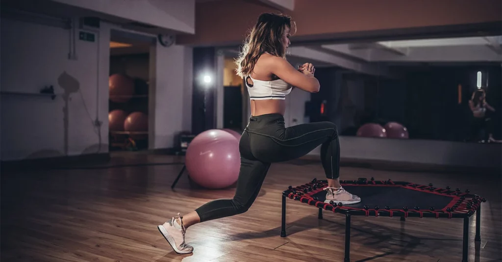 woman performing Trampoline Exercises